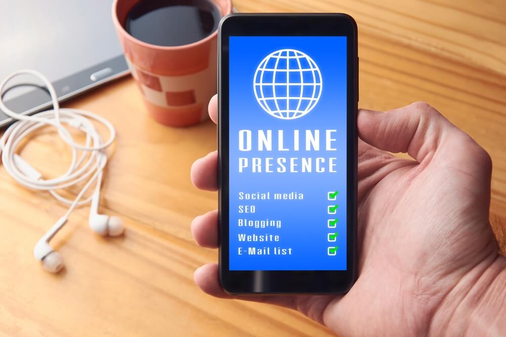 Male hand holding mobile phone with online presence report showing positive results on screen. Strong online presence concept, search engine optimization and digital marketing.