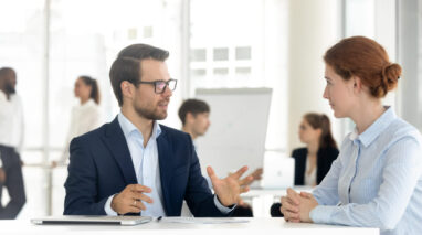 A mentor insurance agent works with a insurance agent student.