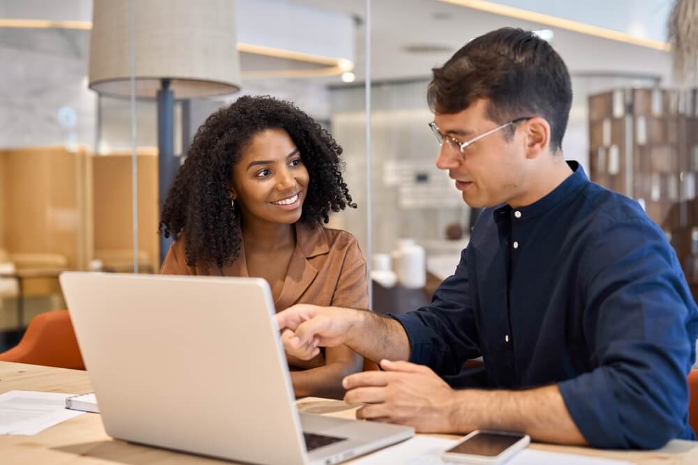 Insurance agent walks a new client through insurance client onboarding.